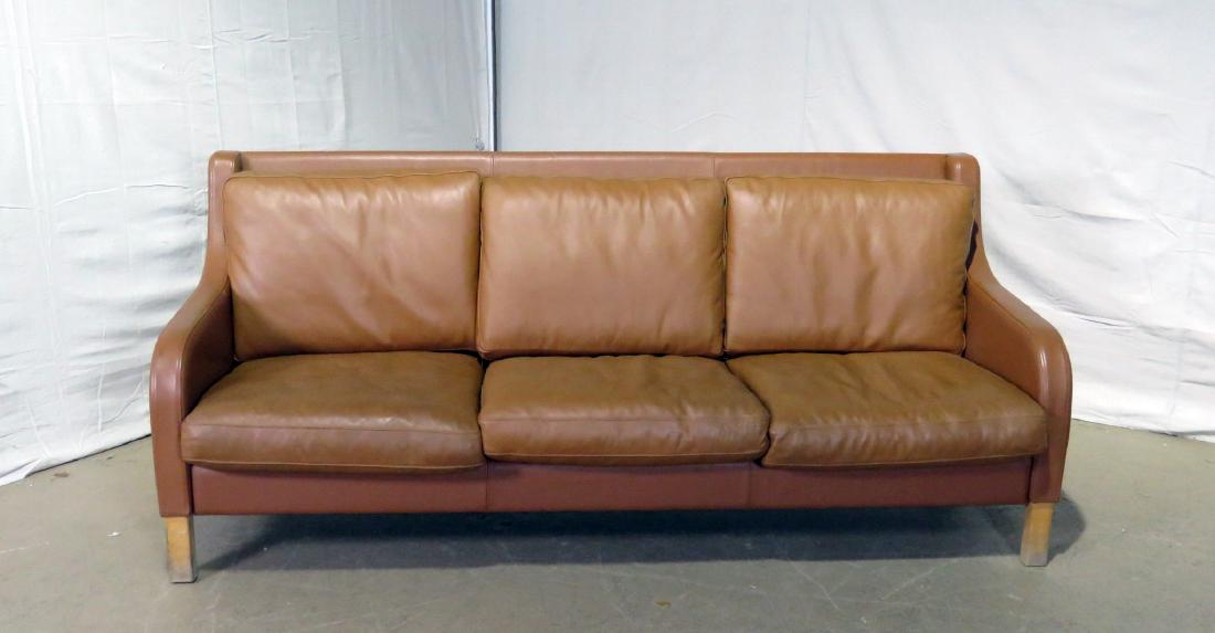DANISH LEATHER SOFA: Leather upholstery. Wood legs. 32 1/2" h x 76" w x 32" d. 15" seat height.