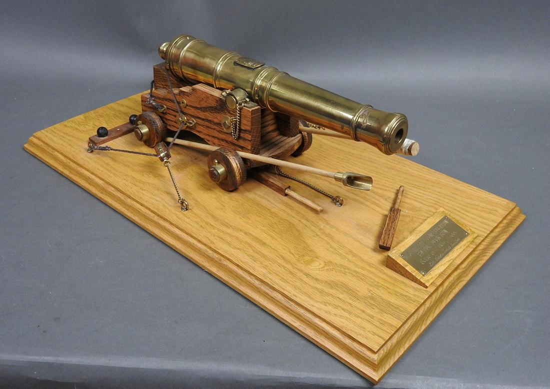 MINITURE SHIPS CANNON U.S FRIGATE CONSTELLATION BY RON: 24 Por Deck Gun. Scale wood and brass ship on wood base. Functioning wheels. Cannon: 4 1/8" h x 4 7/8" w x 12" d Base: 18 1/4" w x 6" d