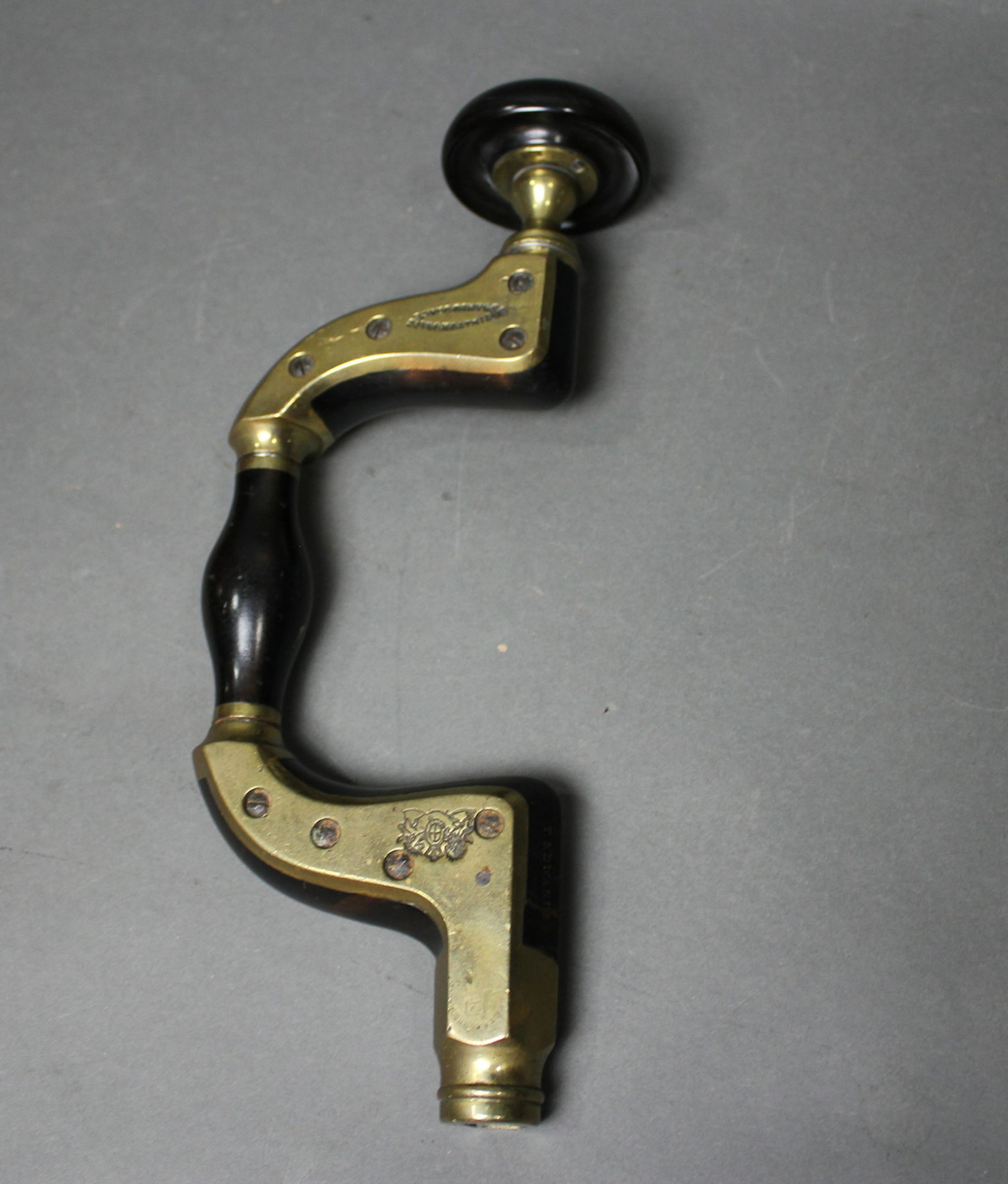 EBONY & BRASS BRACE: 19th century. 13 3/4" h x 3 5/8" w x 7 1/2" d