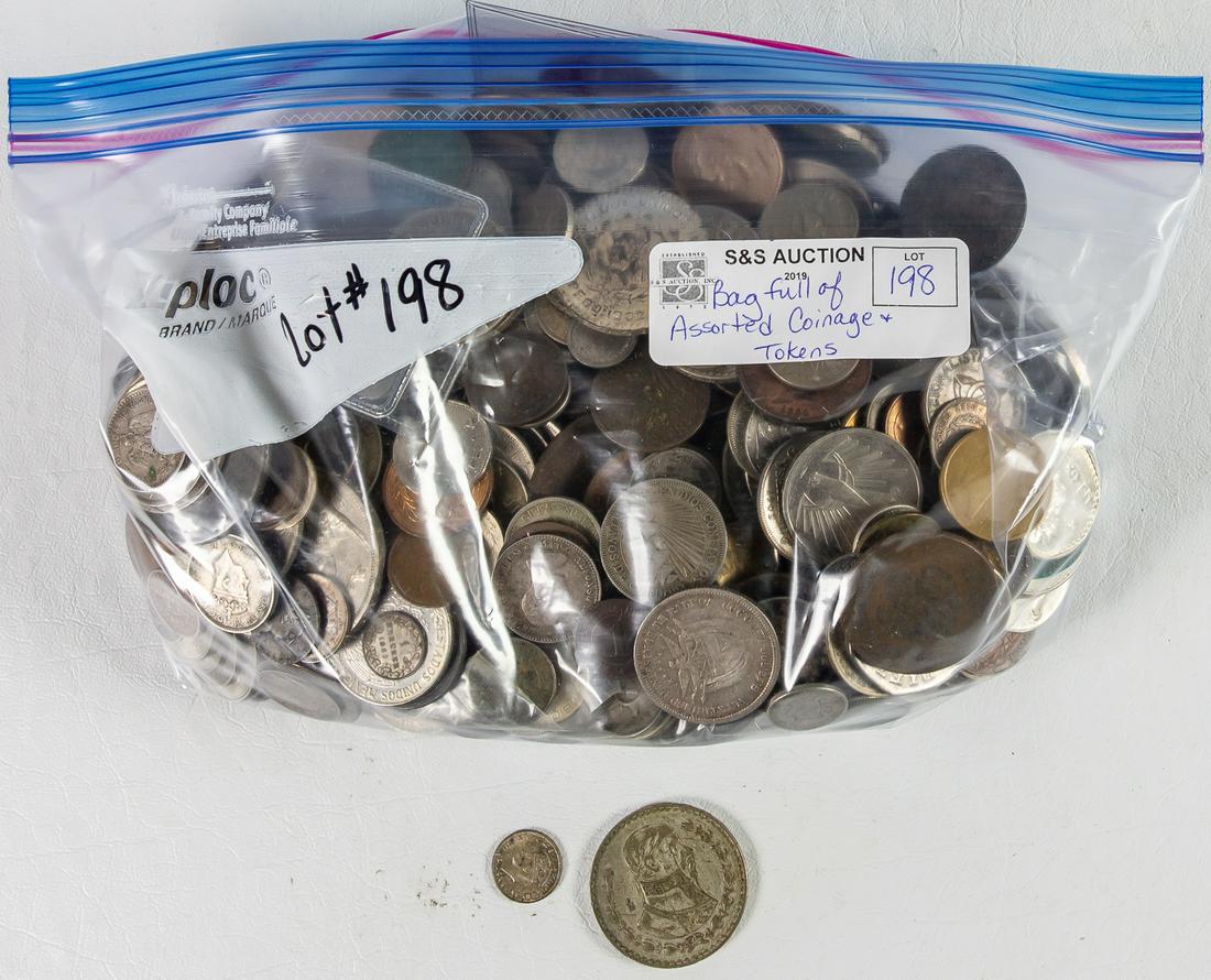 BAG FULL OF ASSORTED TOKENS AND COINAGE FROM AROUND THE (1 of 2)