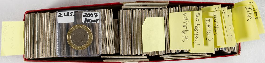 BOX LOT FULL OF COINS FROM AROUND THE WORLD: Great Britain, Ceylon, San Marino, Netherlands, Switzerland, Ireland, Turkey, Palestine, India, Tunisia, Guernsey, Africa, South Africa, Finland, Iran. Assorted dates. Varied grades.