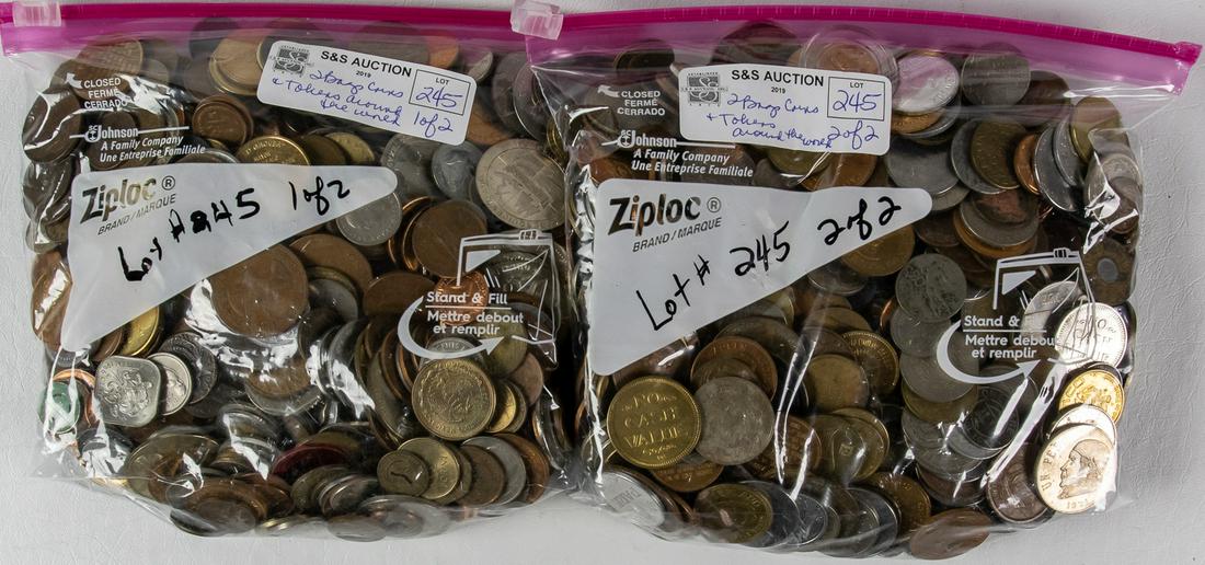 2 BAGS FULL OF ASSORTED COINS AND TOKENS FROM AROUND (1 of 2)