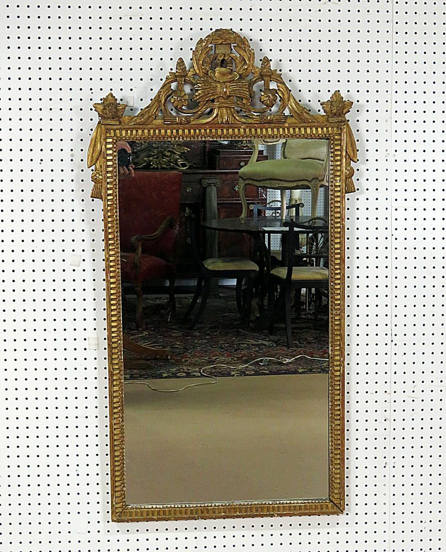 ANTIQUE LOUIS XVI STYLE MIRROR: Gilt wood frame. 49 1/2" h x 27" w.