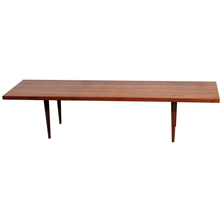 MID CENTURY MODERN COFFEE TABLE: Wood. 14" h x 60" w x 18 1/4" d.