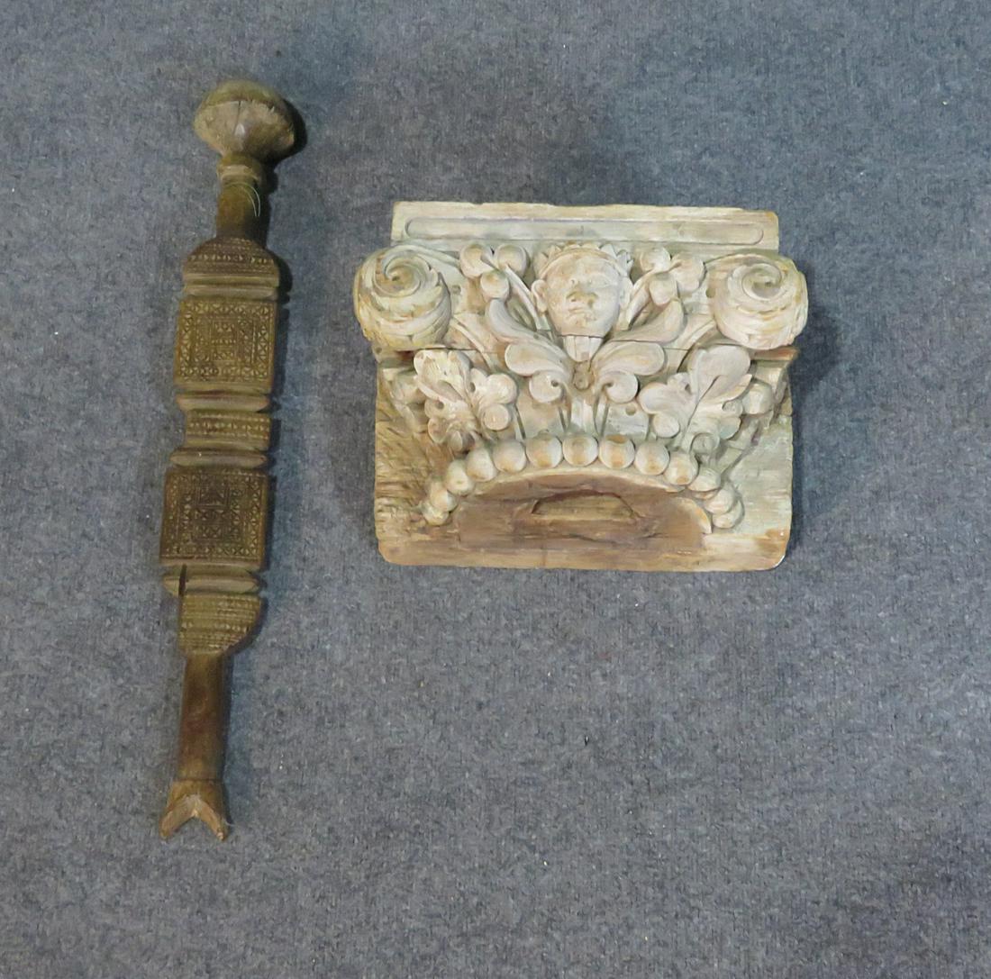 CARVED ARCHITECTUAL ELEMENT AND TRIBAL WAND: Hanging items. Shelf measures 9" h x 13 1/2" w x 10" d. The paddle measures 28 1/2" h x 3 1/2" w x 3 1/2" d.