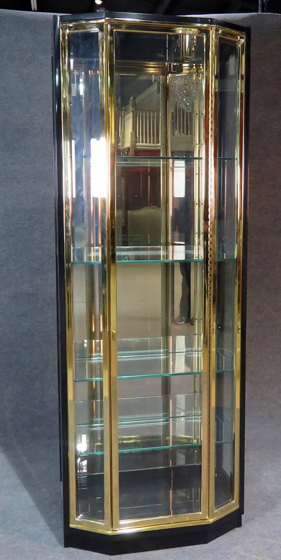HENREDON ONE DOOR ETAGERE: Signed Henredon. Beveled glass. One door. Brass plated. 4 glass shelves. 82" h x 30" w x 17" d.