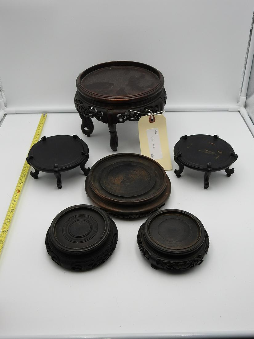 6 PC CHINESE WOOD STANDS: Carved Chinese stands.