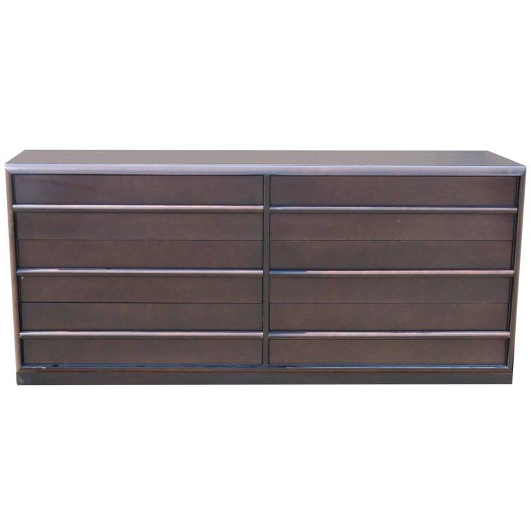 ROBSJOHN GIBBINGS FOR WIDDICOMB CHEST OF DRAWERS: Robsjohn Gibbings for Widdicomb. Dark stained. 31" h x 68 1/2" w x 20 1/2" d.
