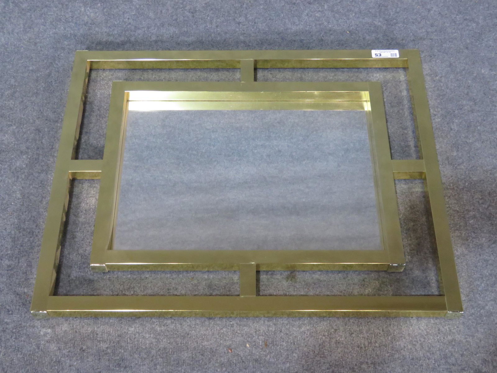 MASTERCRAFT STYLE MIRROR: Gold colored frame. 27 3/4" h x 33 1/2" w x 1 1/2" d.