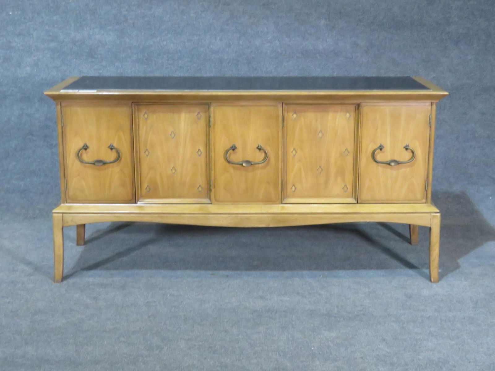 HORIZON BY THOMASVILLE BUFFET: Signed. 4 doors. Two doors containing three drawers. 2 doors containing one shelf. Faux slate top. 30 1/2" h x 60" w x 19" d.