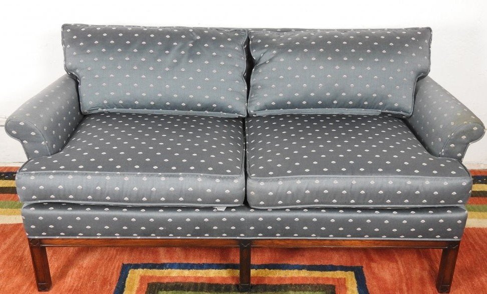 ERWIN-LAMBETH MCM LOVE SEAT: High grade with down cushions. Teal fabric covering with shell motif. 30" h x 64" w x 34" d.