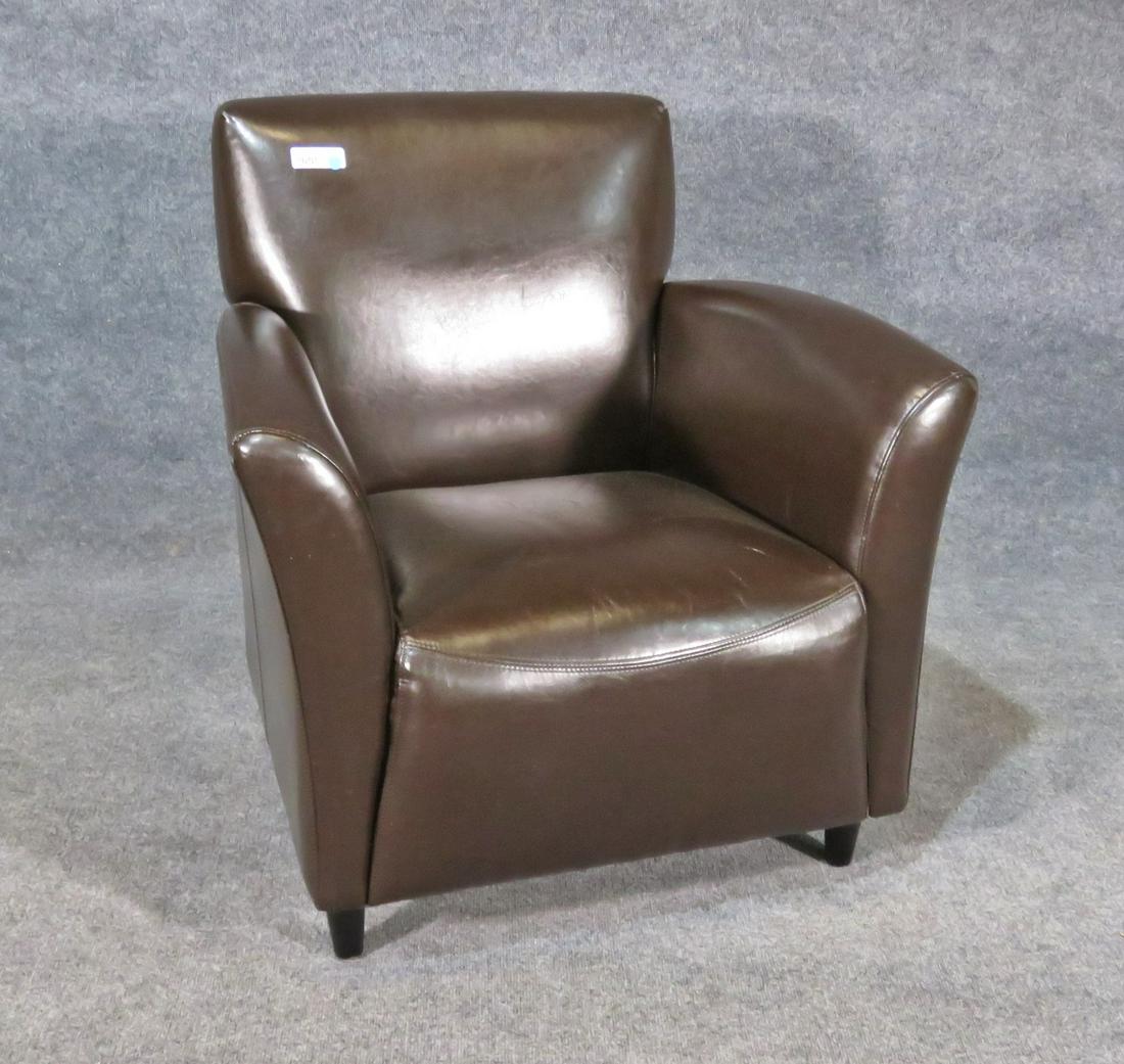 BROWN LEATHER CLUB CHAIR: Brown leather. Wood legs. 34" h x 31" w x 32" d. Seat height 16 1/2".