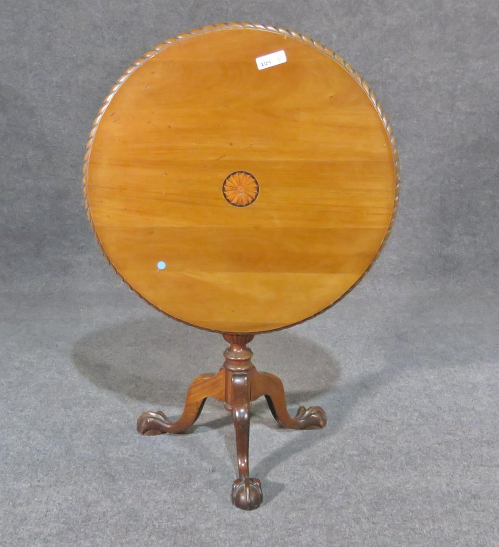 TILT TOP BALL FOOT TABLE: Wood. Tilt top. Ball foot. 29 3/4" h x 30" diameter.