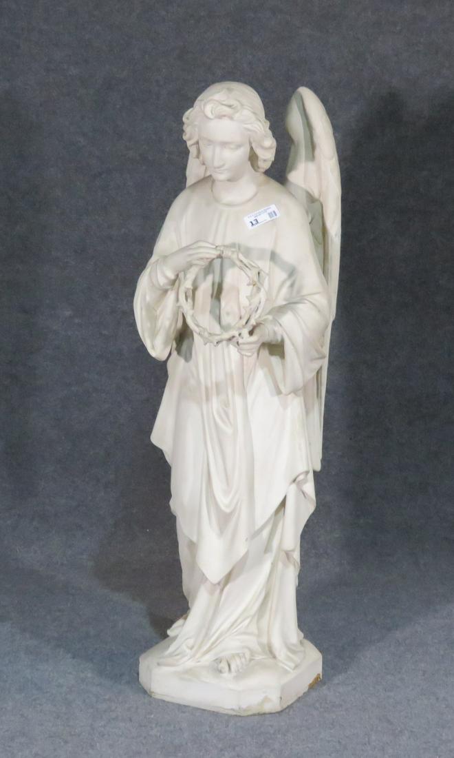 PLASTER & WOOD ANGEL STATUE: Plaster and wood. 49" h x 15" w x 13" d.