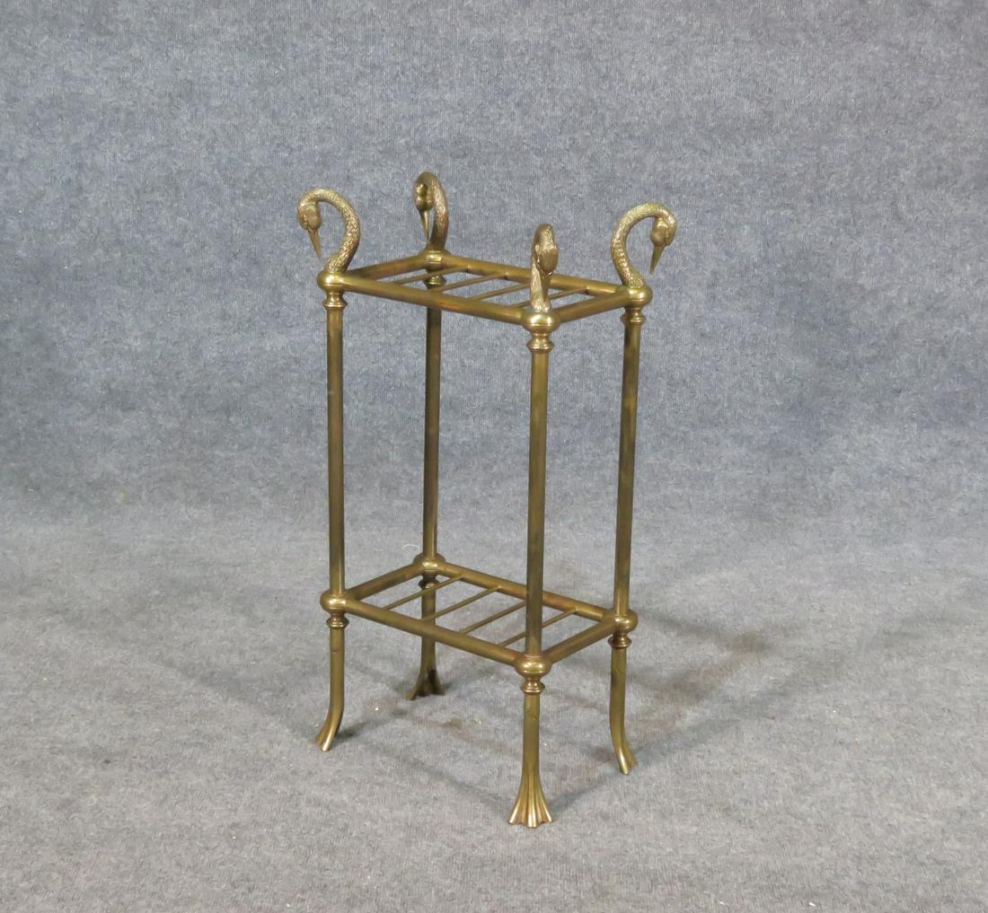 BRASS UMBRELLA STAND: Brass. 2 tier. 28" h x 15" w x 9" d.