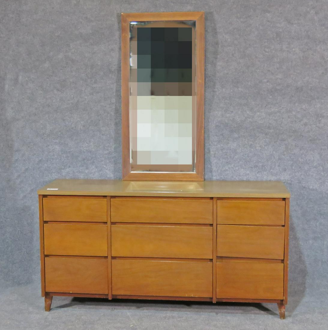 DISTINCTIVE FURNITURE BY STANLEY CHEST AND MIRROR: 9 drawers. Formica top. 31" h x 60" w x 19" d.