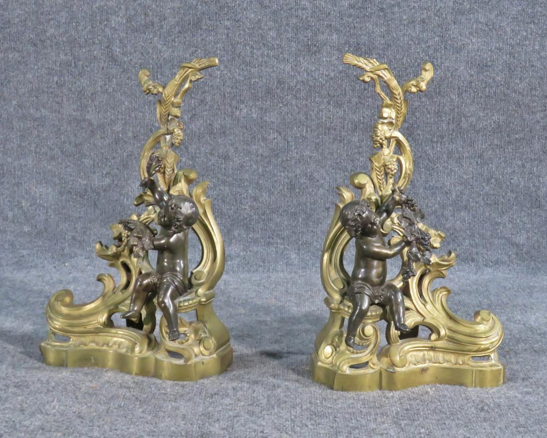 BRASS & BRONZE PUTTI ANDIRONS: Brass and bronze. Figural. 17" h x 12" w x5" d.
