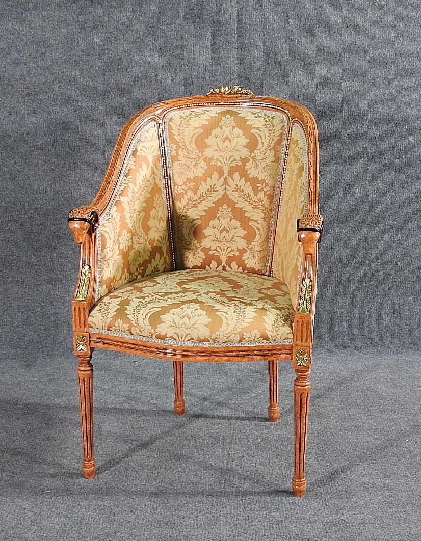 LOUIS XVI STYLE BERGERE: Rams heads. 38 1/2" h x 24 3/4" w x 24" d. Seat height 18 1/2".