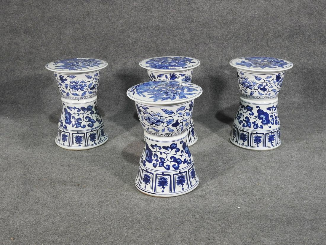 4 PORCELAIN BLUE & WHITE STOOLS: Blue and white porcelain. 17 1/2" h x 12 3/4" diameter.