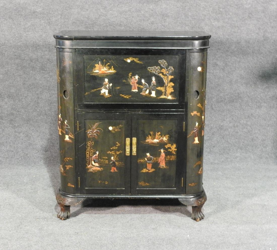 CHINOISIERE BAR CART: Ebonized. Claw feet. 4 doors containing shelves. Flip down and flip open doors containing mirrored center. With mother of pearl. 42" h x 34" w x 18" d.