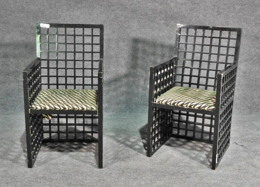 PAIR EBONIZED "CUBISM" CHAIRS: Ebonized wood frames. Upholstered cushion. 36 1/2"h. x 19 3/4"w. x 21 3/4"d. Seat height: 17 1/4"h.