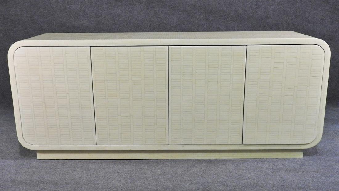 ENRIQUE GARCEL TESSELLATED BONE SIDEBOARD: Tessellated bone finish. 32"h. x 80 1/4"w. x 20 1/4"d