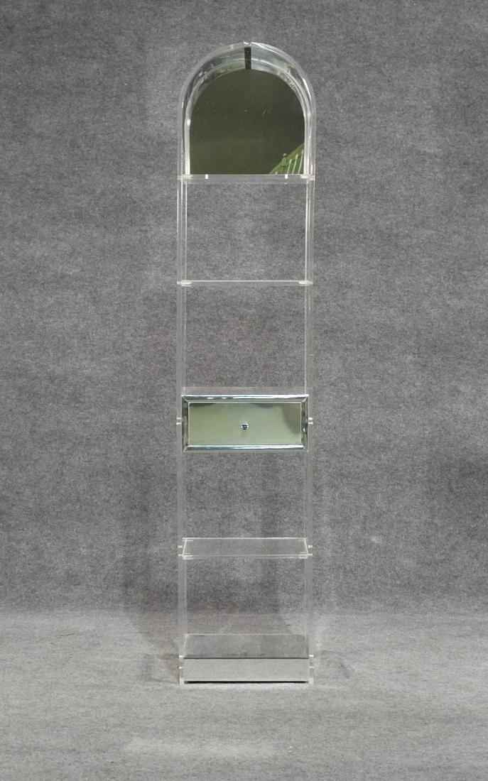 LUCITE AND MIRRORED MODERN ETAGERE: Fully lucite with a mirrored top and center drawer. 71"h. x 15"w. x 12 1/4"d.