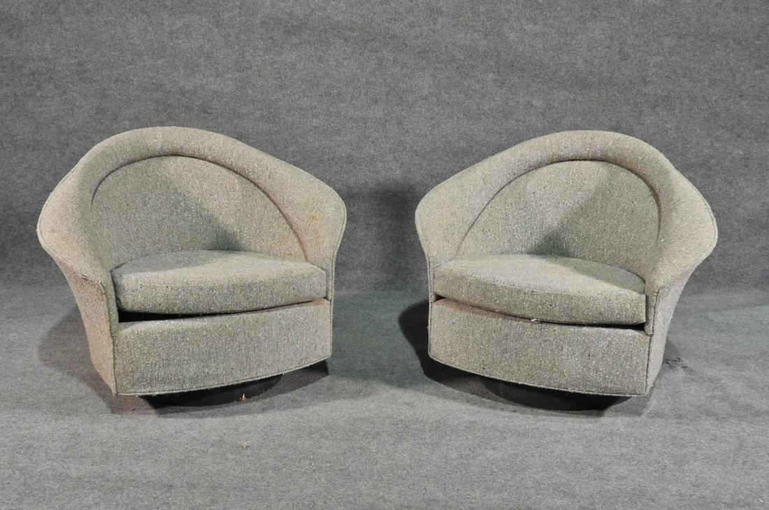 PAIR MODERN CLUB CHAIRS: Swivel and rocking base. Wood frame. Fully upholstered . 29 3/4"h. x 37 1/2"w. x 28"d. Seat height: 16 1/2"h.
