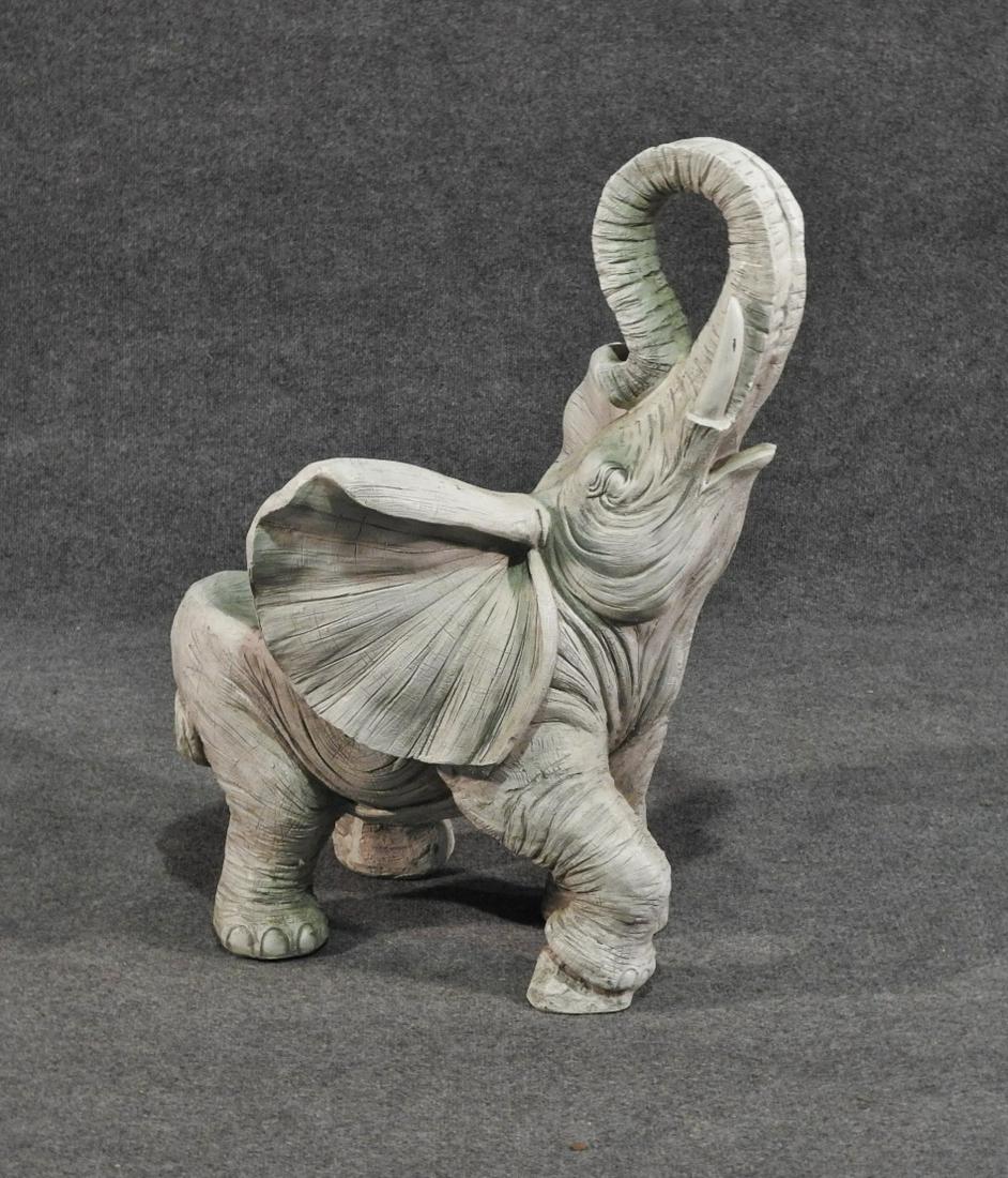 ELEPHANT CHILDS CHAIR: Composite. 31"h. x 19 1/2"w. x 22 1/2"d. Seat height: 13 3/4"h.