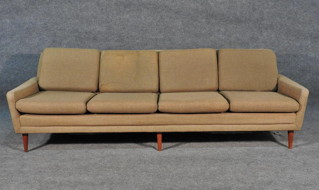 MID CENTURY MODERN SOFA: Upholstered. 28 3/4" h x 96 1/4" w x 33" d. Seat height 17 1/2".