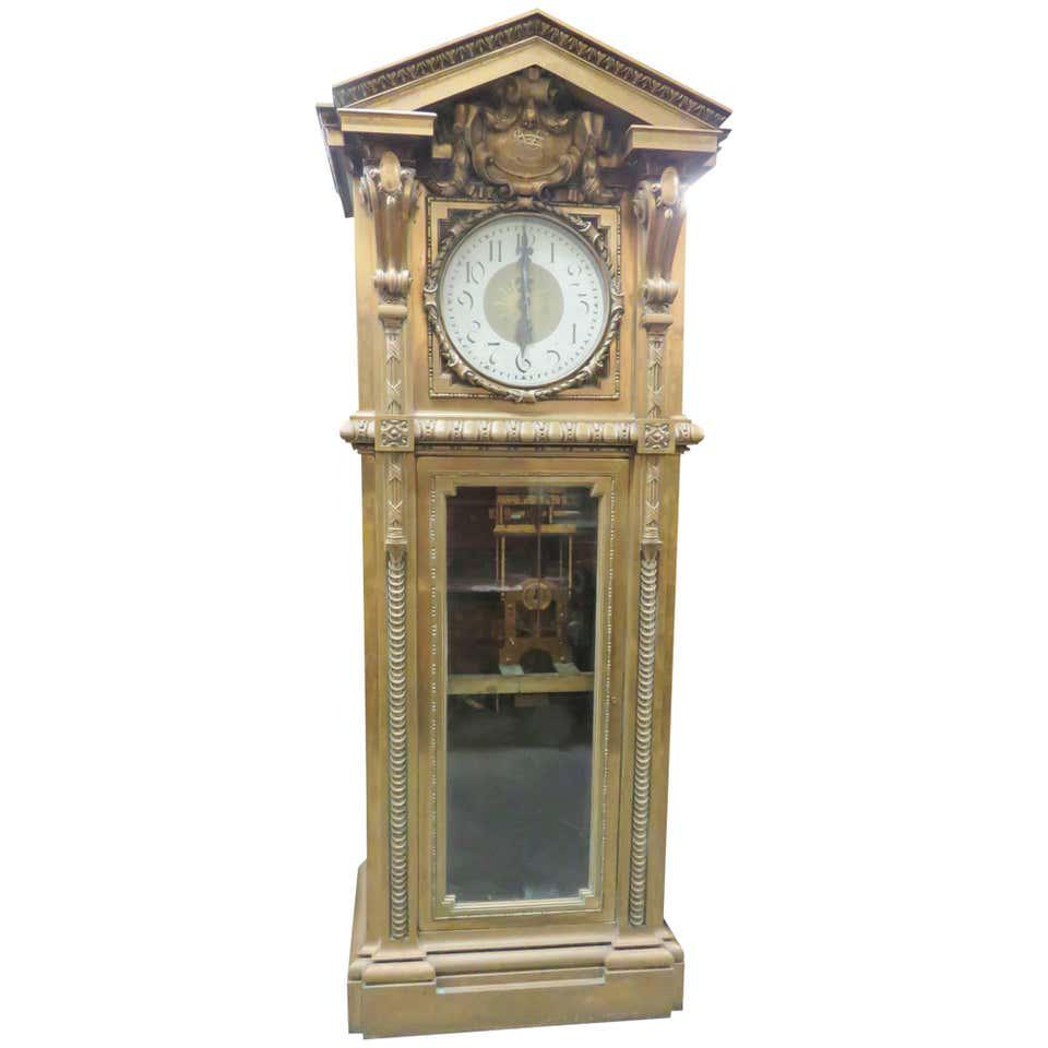 MONUMENTAL SINGER SEWING CO BRONZE MASTER CLOCK: Built by Magenta Master Clock Co. Switzerland for the singer sewing machine company building in New York City. This clock Is unique and magnificent with bronze frame. 100" h x 35" w x 18" d.