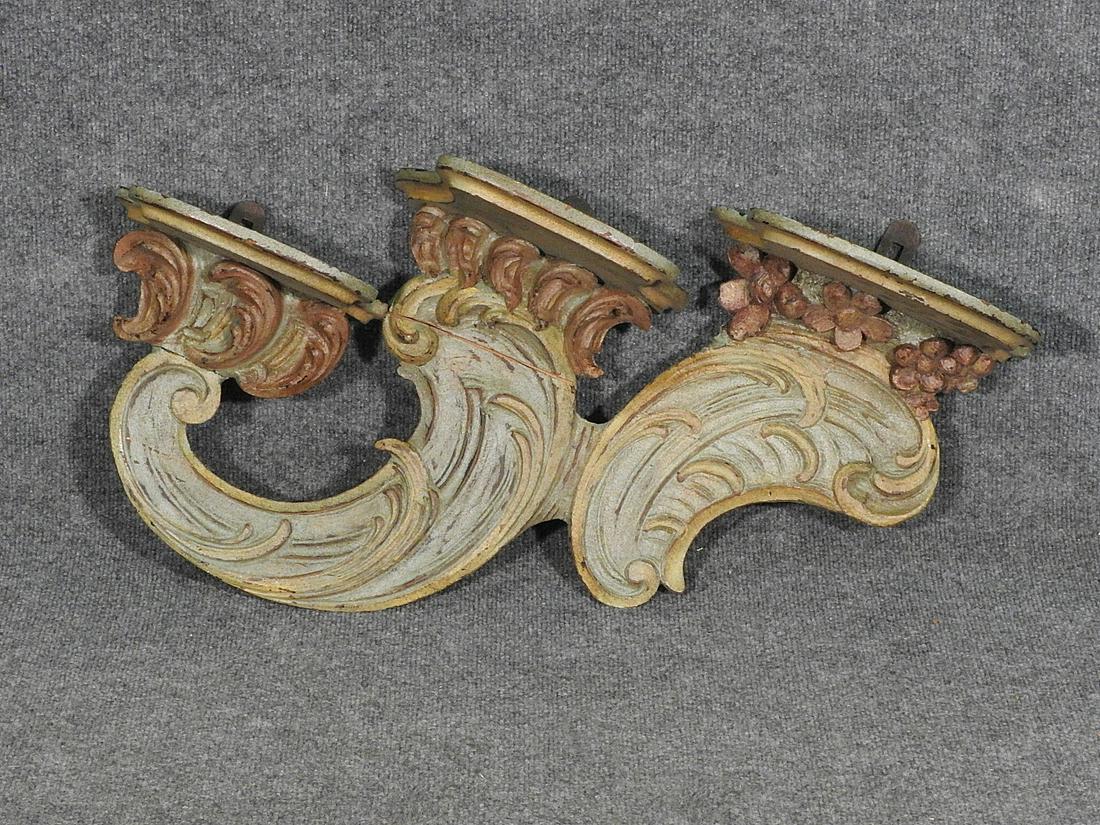 CARVED WOOD HANGING ELEMENT: Carved. Painted. 17" h x 28 1/4" w x 7 1/8" d.