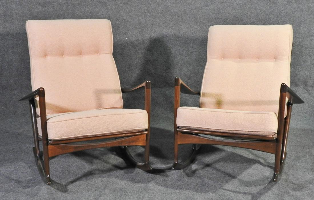 PAIR SELIG ROCKERS: Denmark. Wood frame. Upholstered. 36 1/2" h x 31 7/8" w x 30" d. Seat height 18".