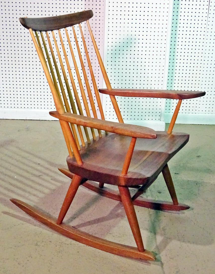 NAKASHIMA ROCKING CHAIR: Walnut. 36" h x 24 3/4" w x 29" d. Seat height 15 1/4".