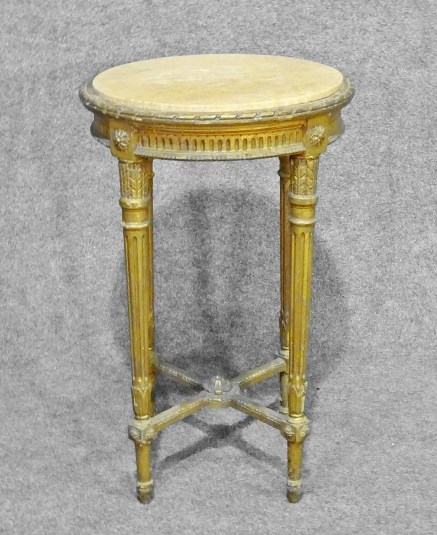 LOUIS XVI STYLE MARBLE TOP GUERIDON: Gilded base. Marble top. 31 1/2" h x 20" w x 20 d.