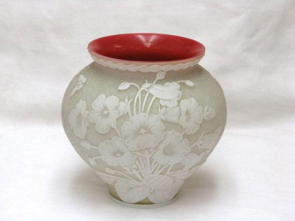 6" WEBB CAMEO GLASS VASE: Cranberry, opaque white with white flowers in relief. Butterflies and bellflowers. Unsigned but attributed Thomas Webb. Excellent condition. 5 3/4"h. x 6" diameter.