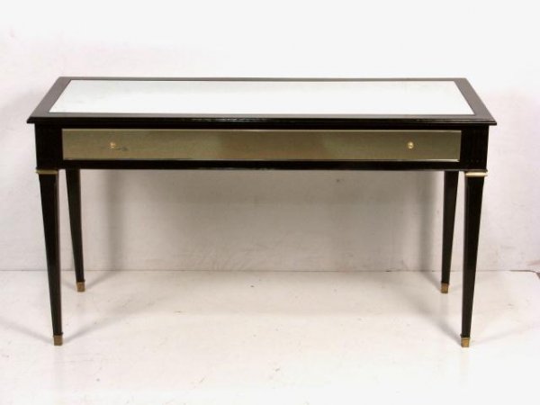 JANSEN EBONIZE & GILT MIRRORED CENTER TABLE: Very good condition. 30 1/2"h. x 55"w. x 21 1/2"d.