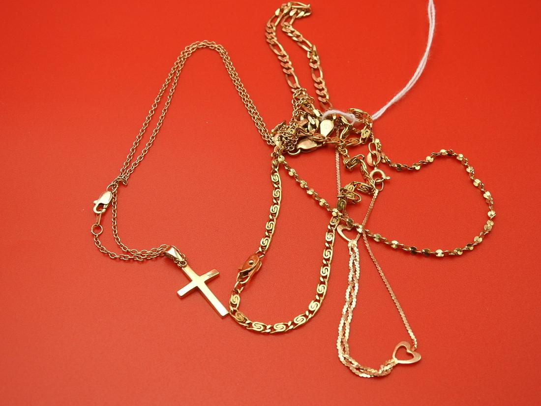 5 PC 14KT GOLD GROUP: One 7" double heart bracelet. One 9" serpentine bracelet. One 7" twist link bracelet. One 7" chain link bracelet. One 18" fine chain link necklace with crucifix. 9.7 DWT.