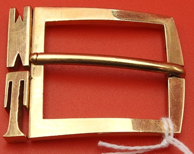 14KT GOLD BELT BUCKLE: Art deco style buckle with raised initials W and T. 14KT. 1 1/2" x 1 1/2". 12.4 DWT.