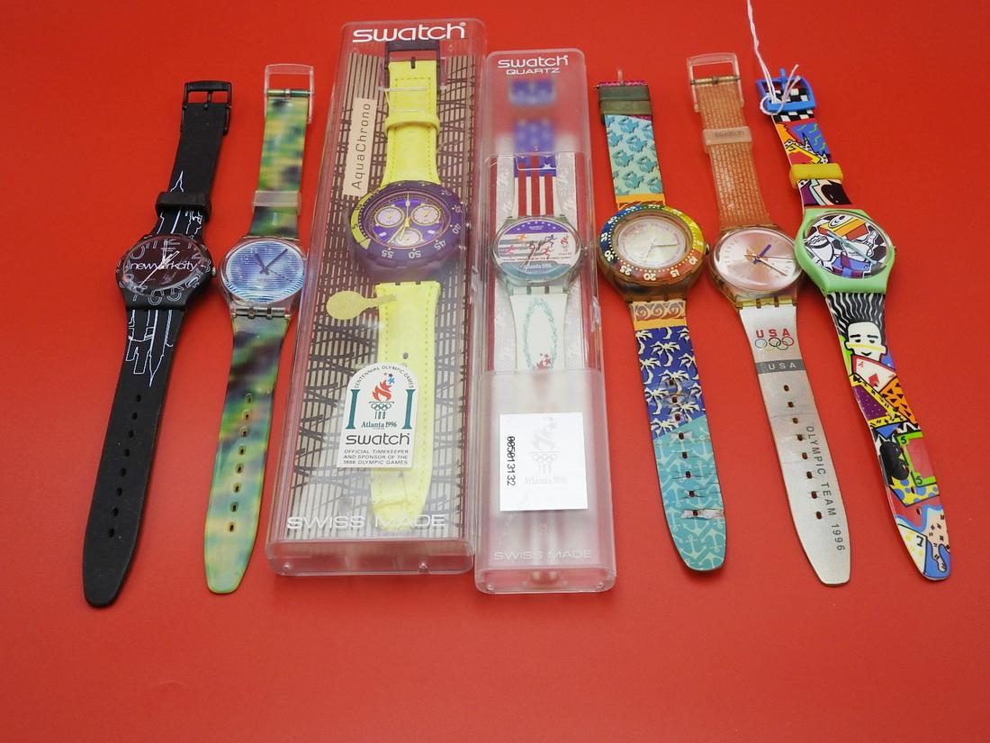GROUP 7 WATCHES INCLUDING SWATCH: Assorted watches.