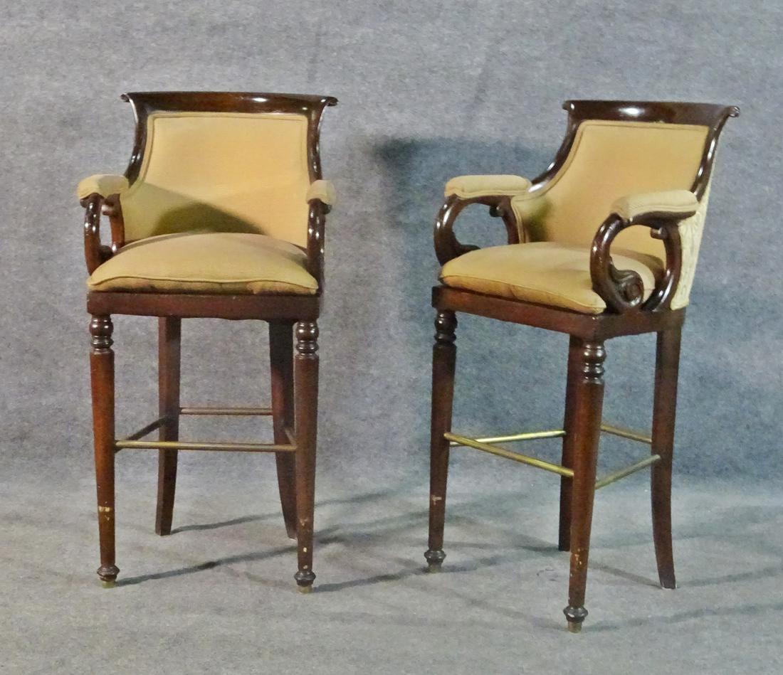 PAIR WALNUT BAR STOOLS: Walnut and metal frames. Upholstered back and seat. 46" h x 23 1/4" w x 22" d. Seat height 32".