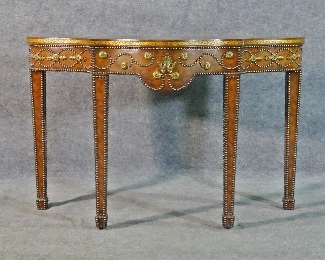 MAITLAND SMITH LEATHER WRAPPED CONSOLE: Nail head trim. Leather wrapped. 35" h x 54" w x 20 1/4" d.