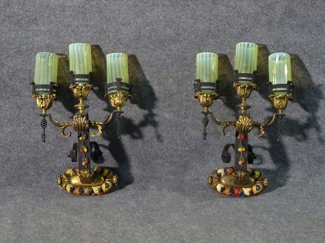 PAIR WROUGHT IRON WALL MOUNT SCONCES: Brass accents. Wrought iron. Painted. 19 1/4" h x 15 1/2" w x 10" d.