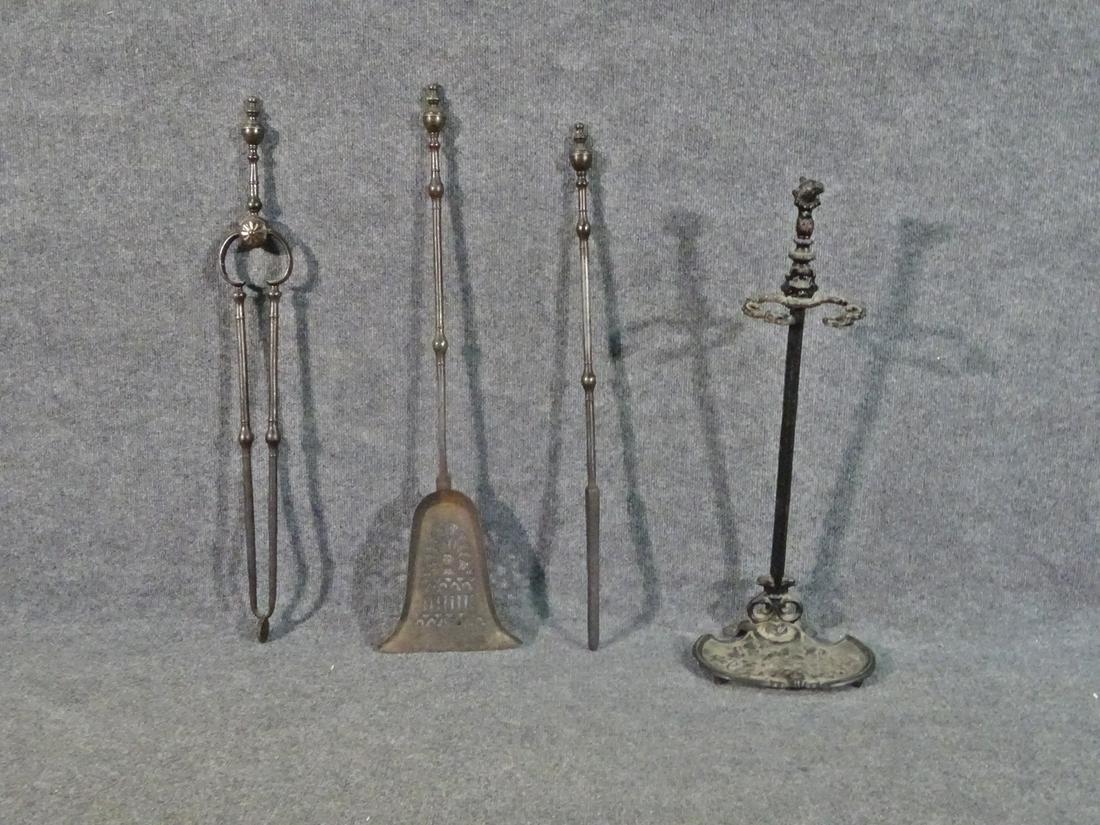 3 PC FIREPLACE TOOLS W STAND: Wrought iron. Tong, shovel and poker. 31 1/2" h x 10" w x 8 3/4" d.