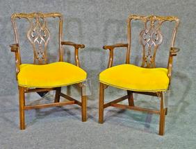 PAIR BAKER ARM CHAIRS: Wood frames. Upholstered seats. Nail head trim. Carved. 38" h x 24" w x 22 1/2" d. Seat height 20".