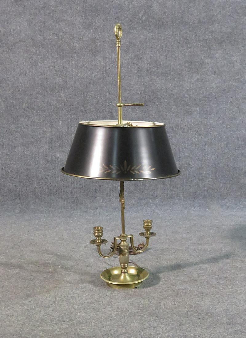 ANTIQUE TOLE SHADE LAMP: Brass base. Paint decorated tole shade. Finial top. 31 3/4" h x 14 1/2" diameter.