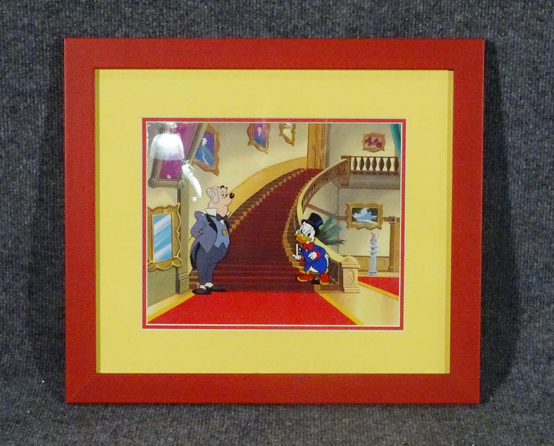 UNCLE SCROOGE IN MANSION CARTOON CEL: In wood frame. Framed measures 14 1/2" h x 16 1/2" w x 3/4" d. Picture measures 8 1/4" h x 7 1/2" w.
