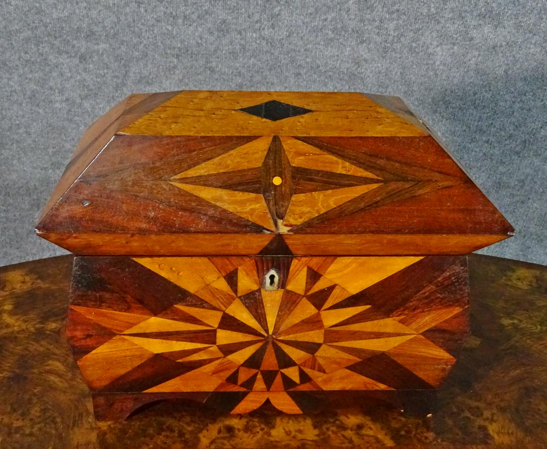 ANTIQUE INLAID BOX: Wood. Inlaid. Flip up lid. Under lid there is a flip down door containing compartment that has 2 lidded side compartments and center has glass insert. 11" h x 14 1/2" w x 9" d.