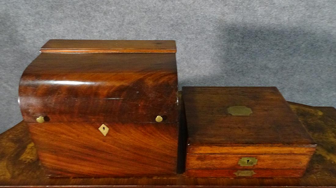 TWO ANTIQUE CONTINENTAL BOXES: Wood. Metal hardware. Lift up lids. One has lined interior with removable shelf. Measures 9 3/8" h x 11 1/4" w x 7 7/8" d. Other has lined interior and measures 3 7/8" h x 10" w x 9" d.