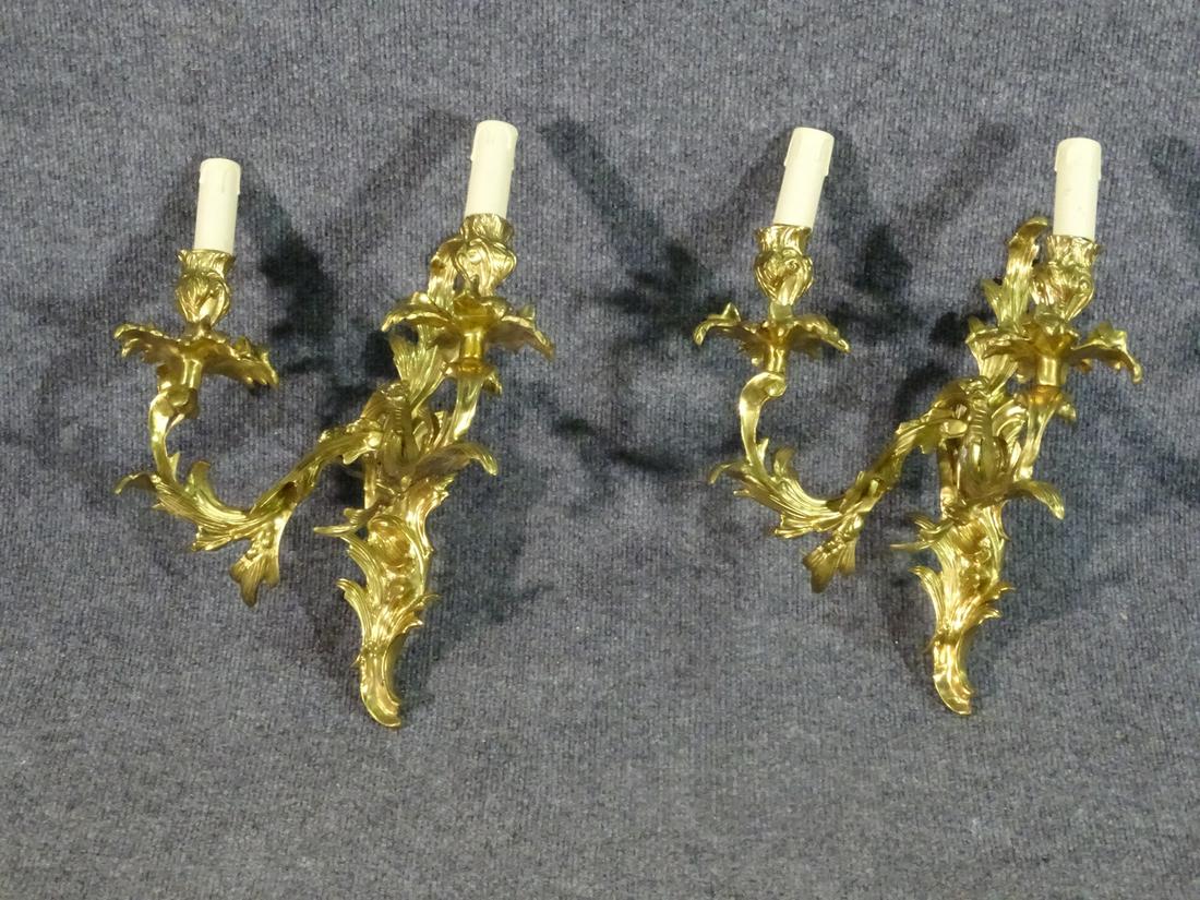 PAIR BRASS LOUIS XV STYLE WALL MOUNTED SCONCES: Brass. 15" h x 12" w x 6 1/2" d.